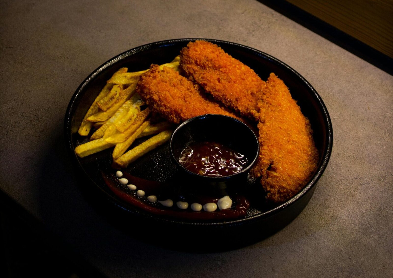 Crispy Chicken Strips Served With French Fries