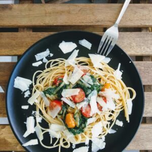 Pasta Dish wiht Spaghetti, Spinach, Cherry and Parmesan Cheese